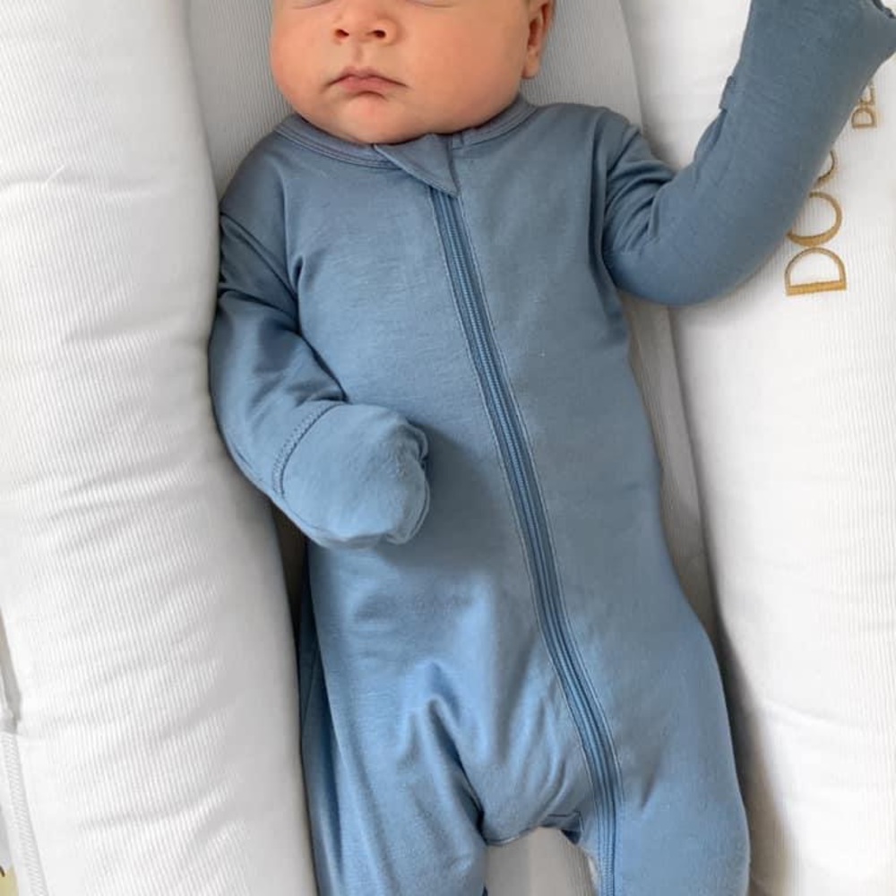 Spearmint Love dusty blue footed zipper onesie